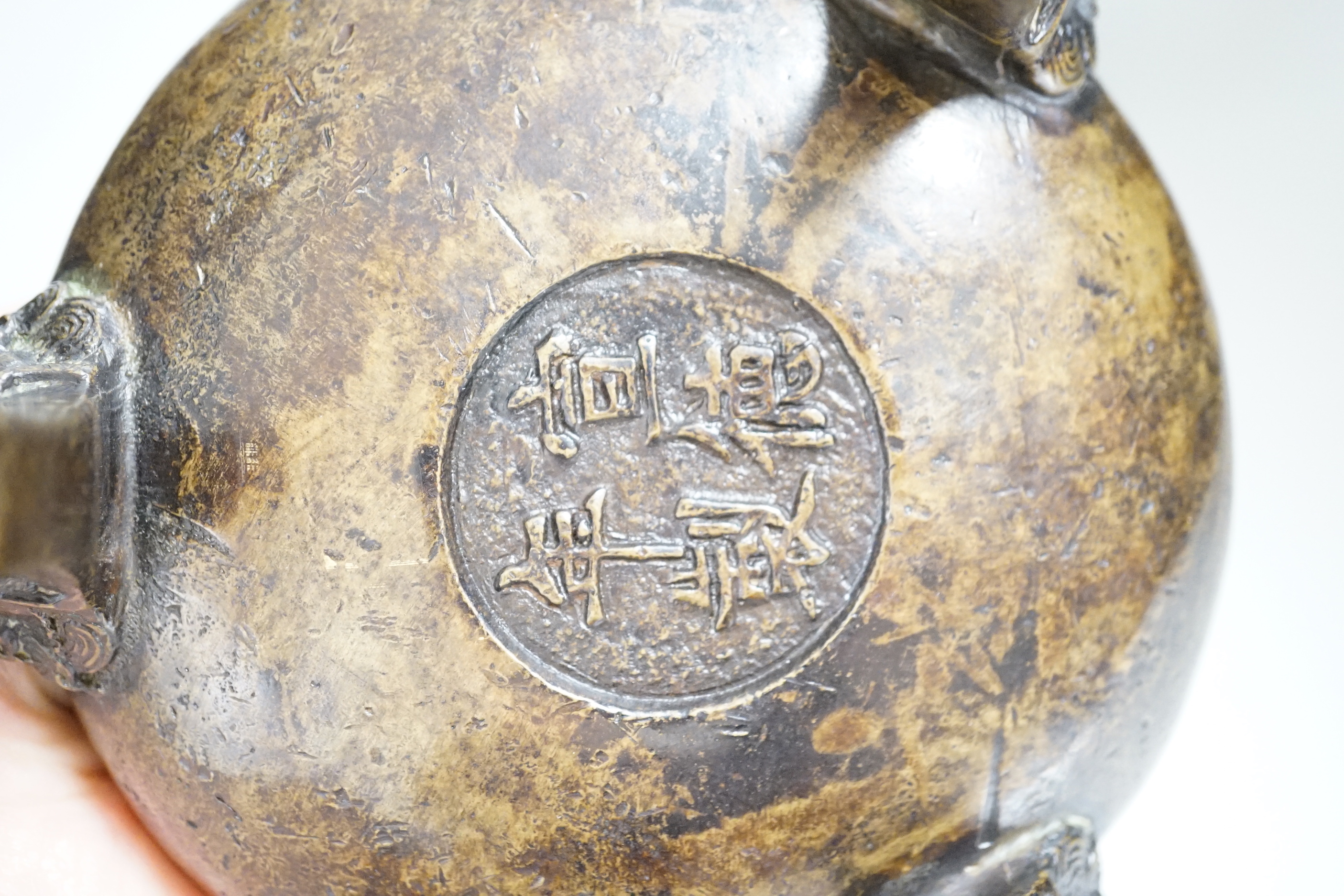 A Chinese bronze censer, 15cm high and a Chinese brass bowl, 13cms high